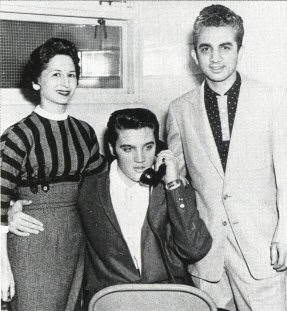 Stan and Paula with Elvis during autograph session at the store.