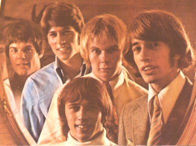 The five Bee Gees, late 1967:
Back row, left to right - Vince Melouney, Barry Gibb, 
Colin Peterson, Robin Gibb; Front: Maurice Gibb.
