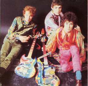 Cream, in psychedelic getup, late 1967.
From left, Baker, Bruce, Clapton.